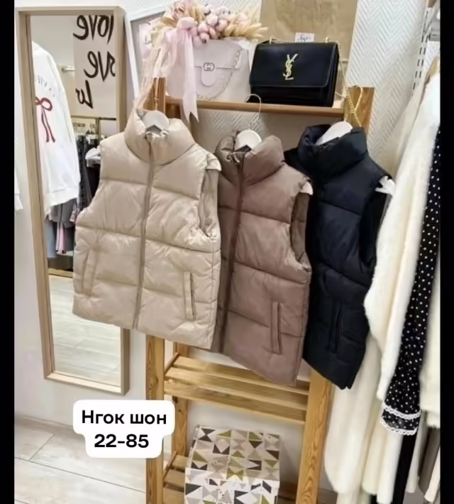 Женские жилетки